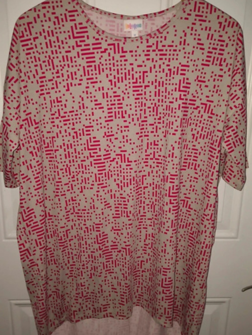 LuLaRoe Beige Top with Pink Geometric Print